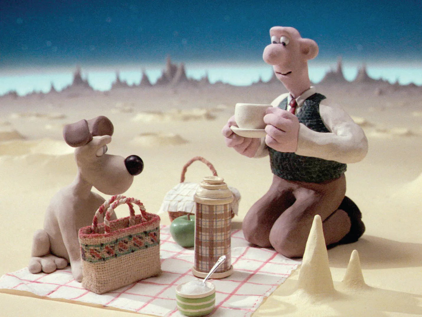 Wallace and Gromit enjoying a picnic on the moon in A Grand Day Out